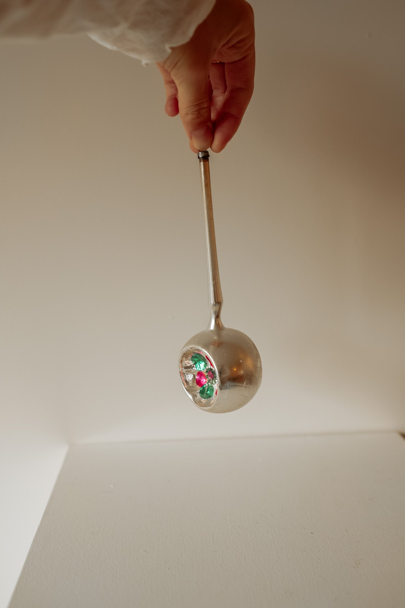 Unique vintage hand blown Christmas ornament with dents