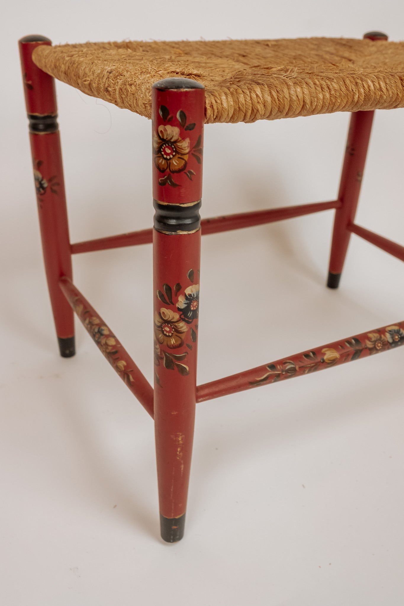 Wooden stool with burgundy papercord seat