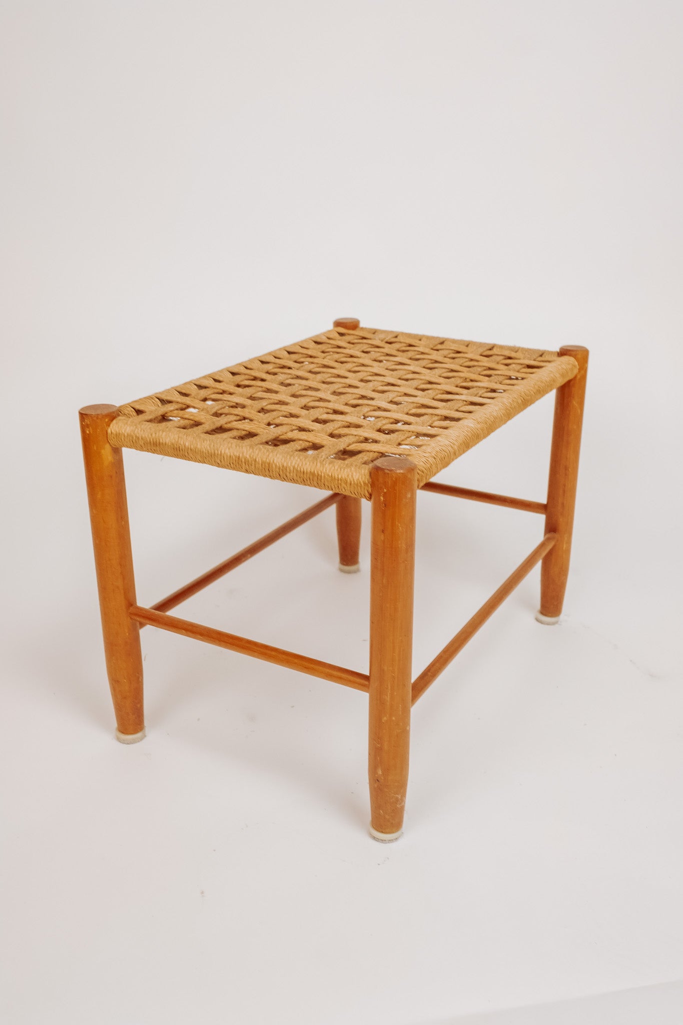 Wooden stool with burgundy papercord seat