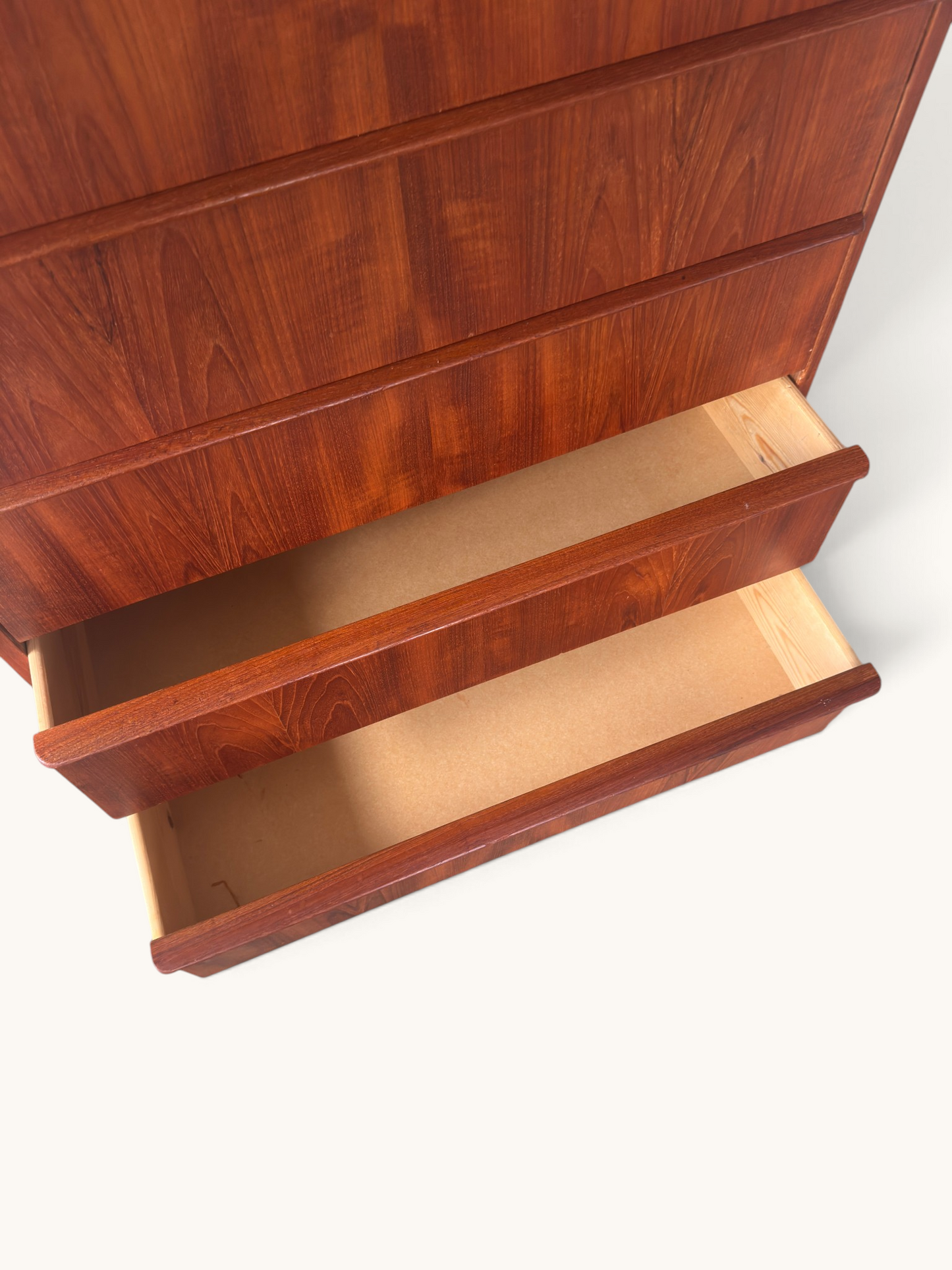 Vintage Deense teak "tallboy" ladekast met 7 lades