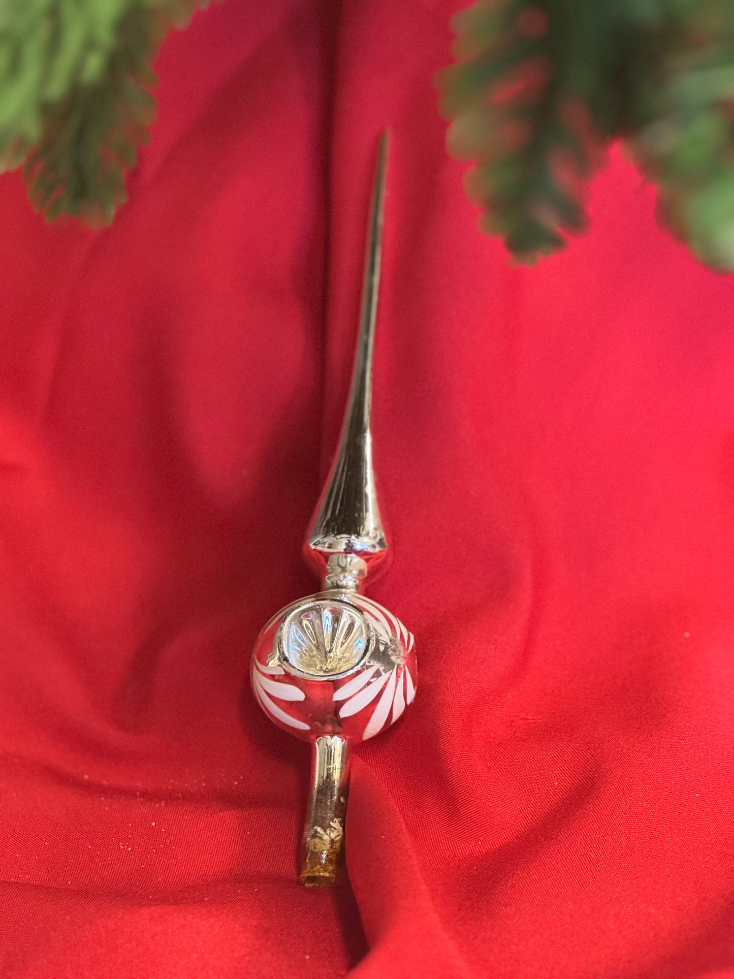 Vintage mondgeblazen zilveren piek met deuken