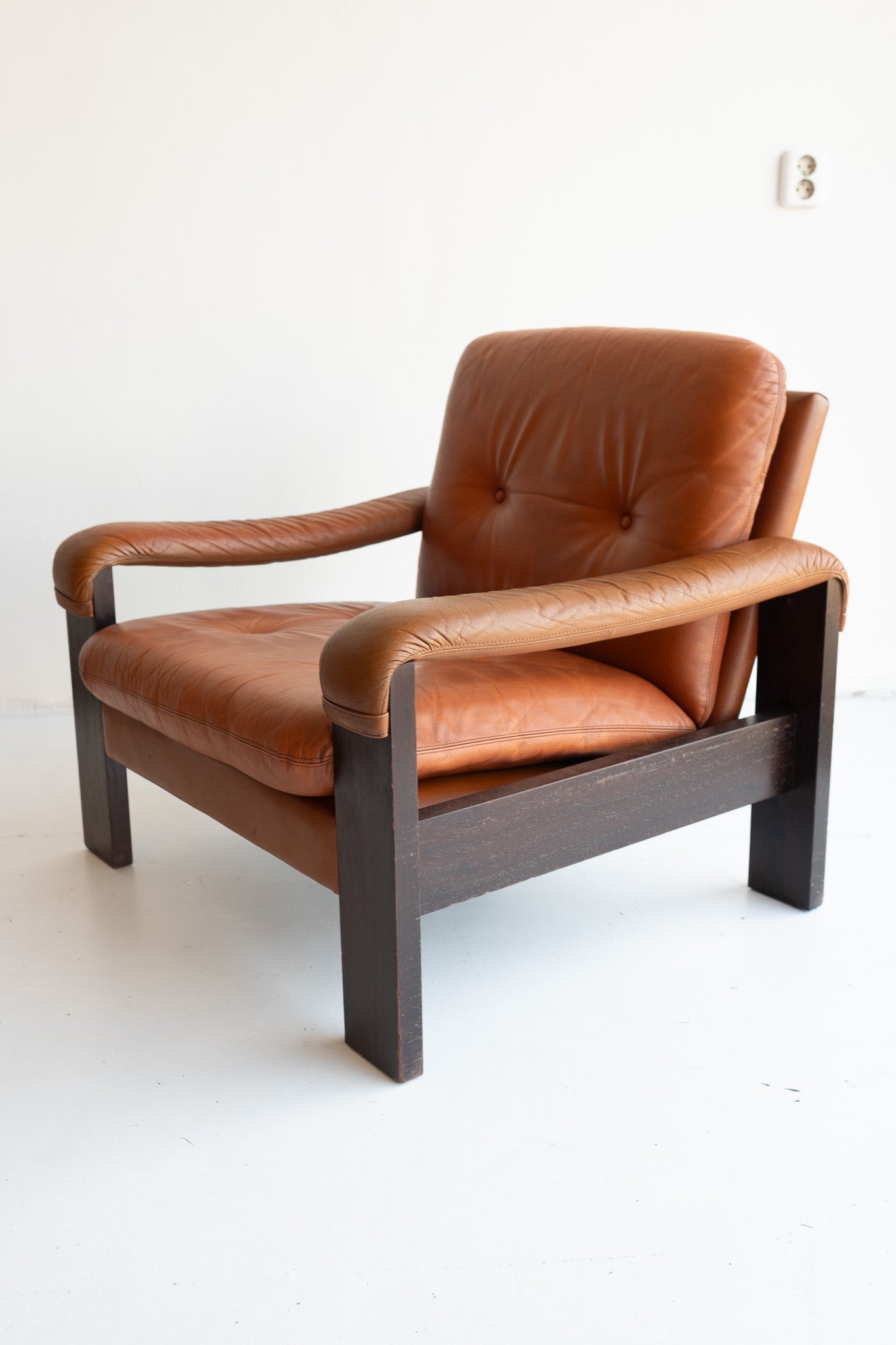 Deense cognac leren fauteuil jaren 70