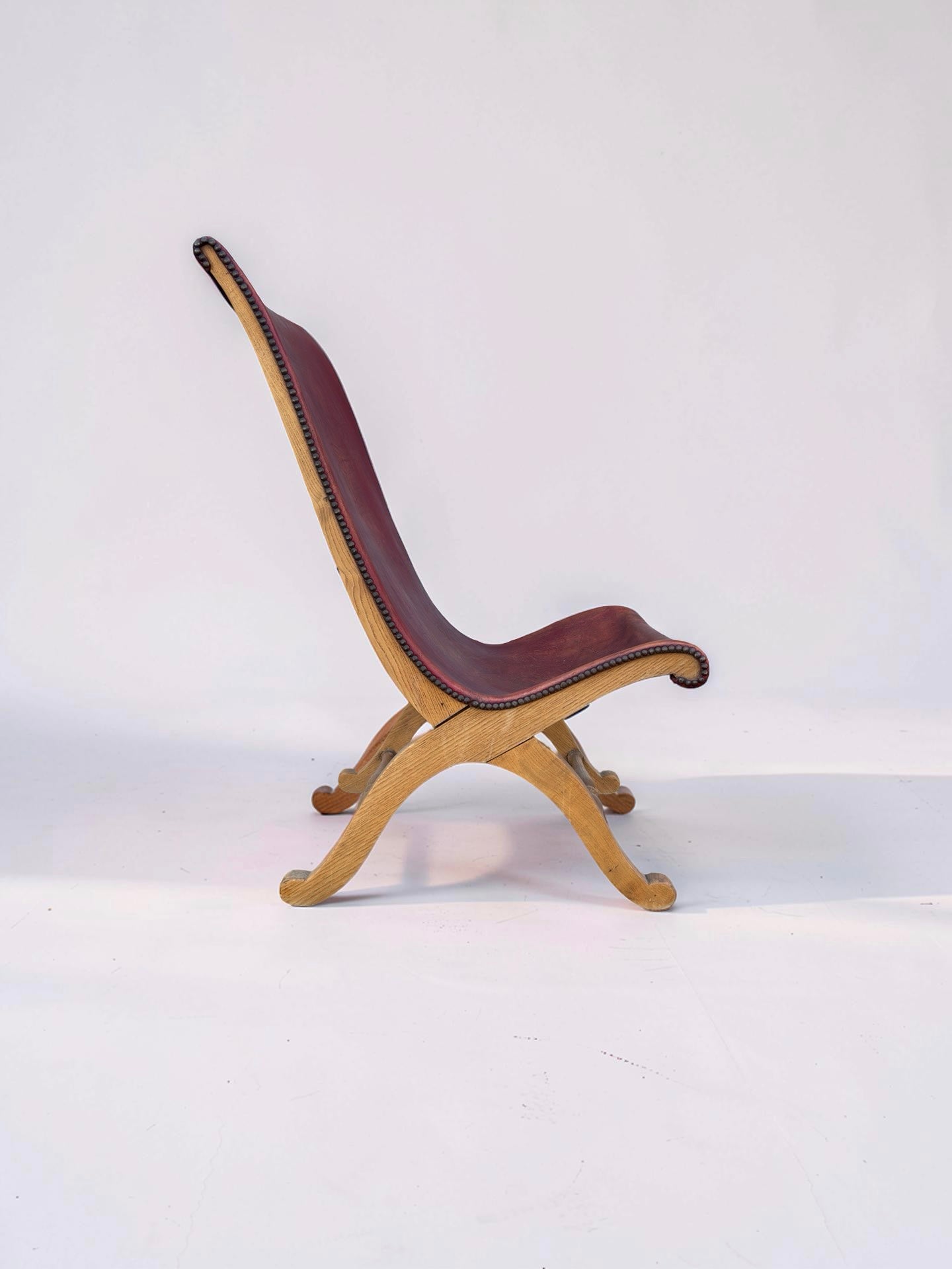 Slipper chair van rood leer van Pierre Lottier voor Valenti