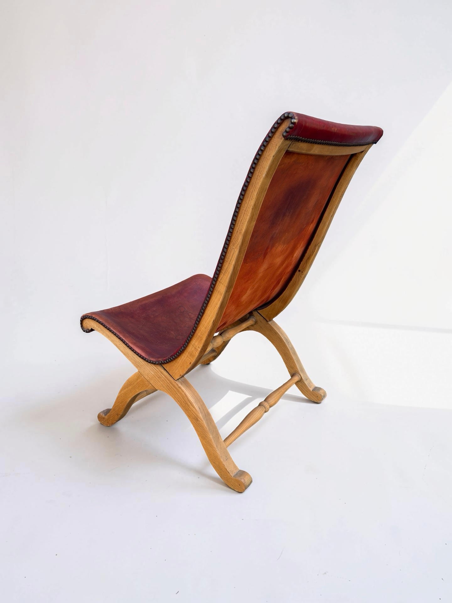 Slipper chair van rood leer van Pierre Lottier voor Valenti