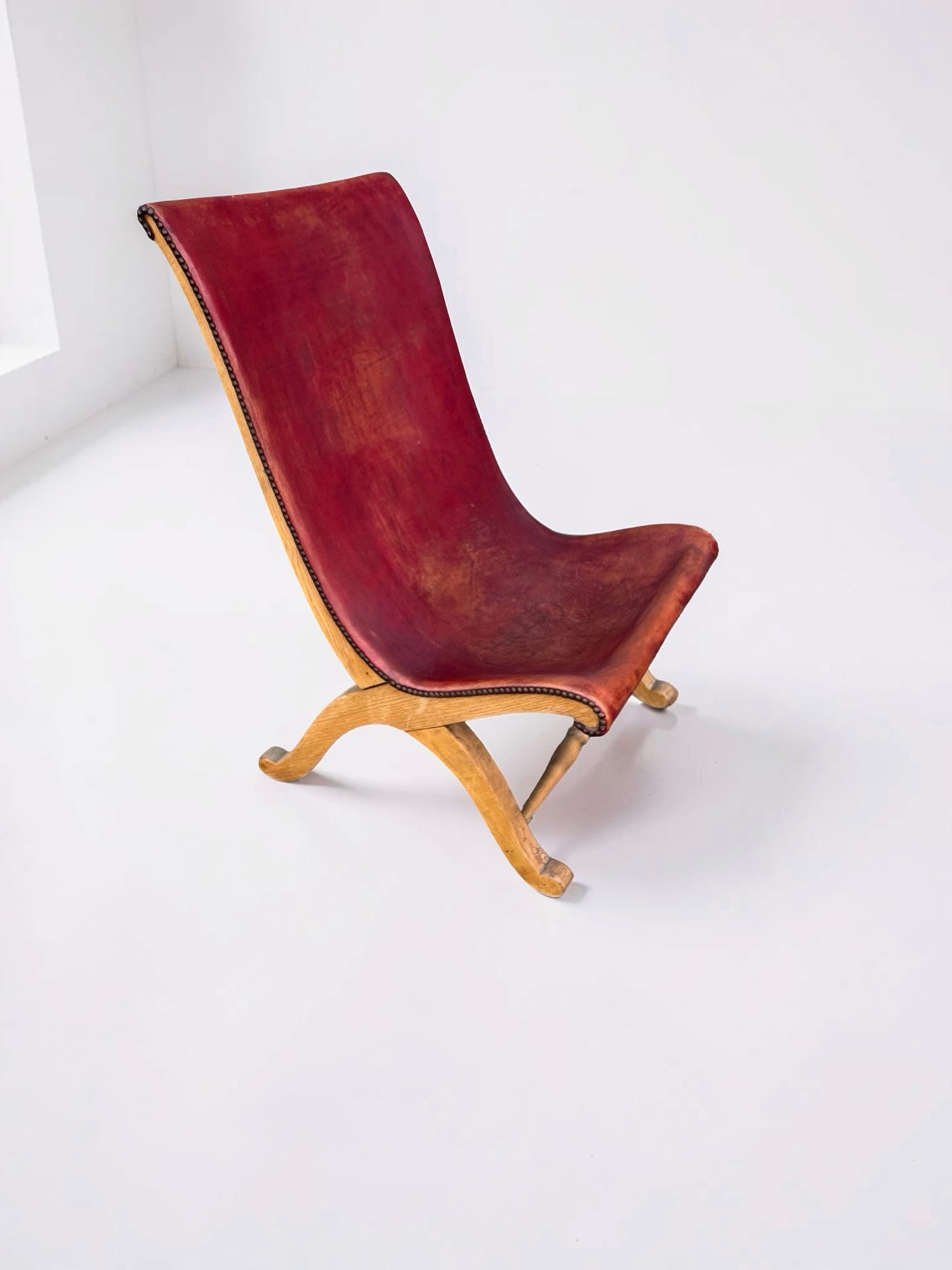 Slipper chair van rood leer van Pierre Lottier voor Valenti