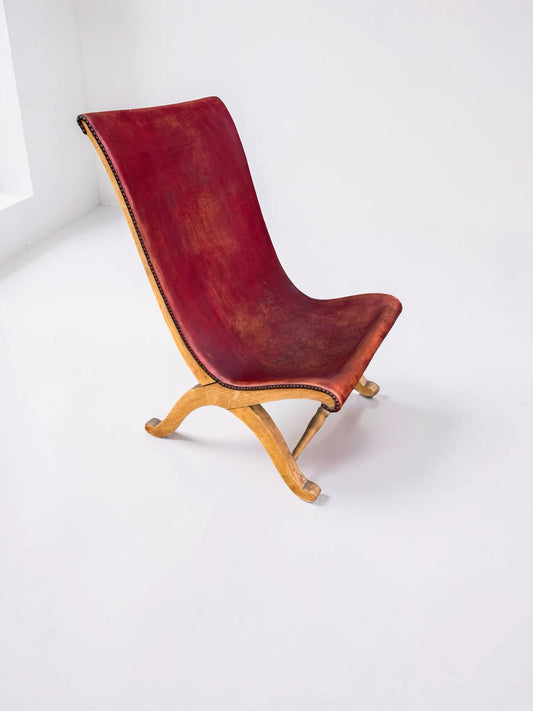 Slipper chair van rood leer van Pierre Lottier voor Valenti