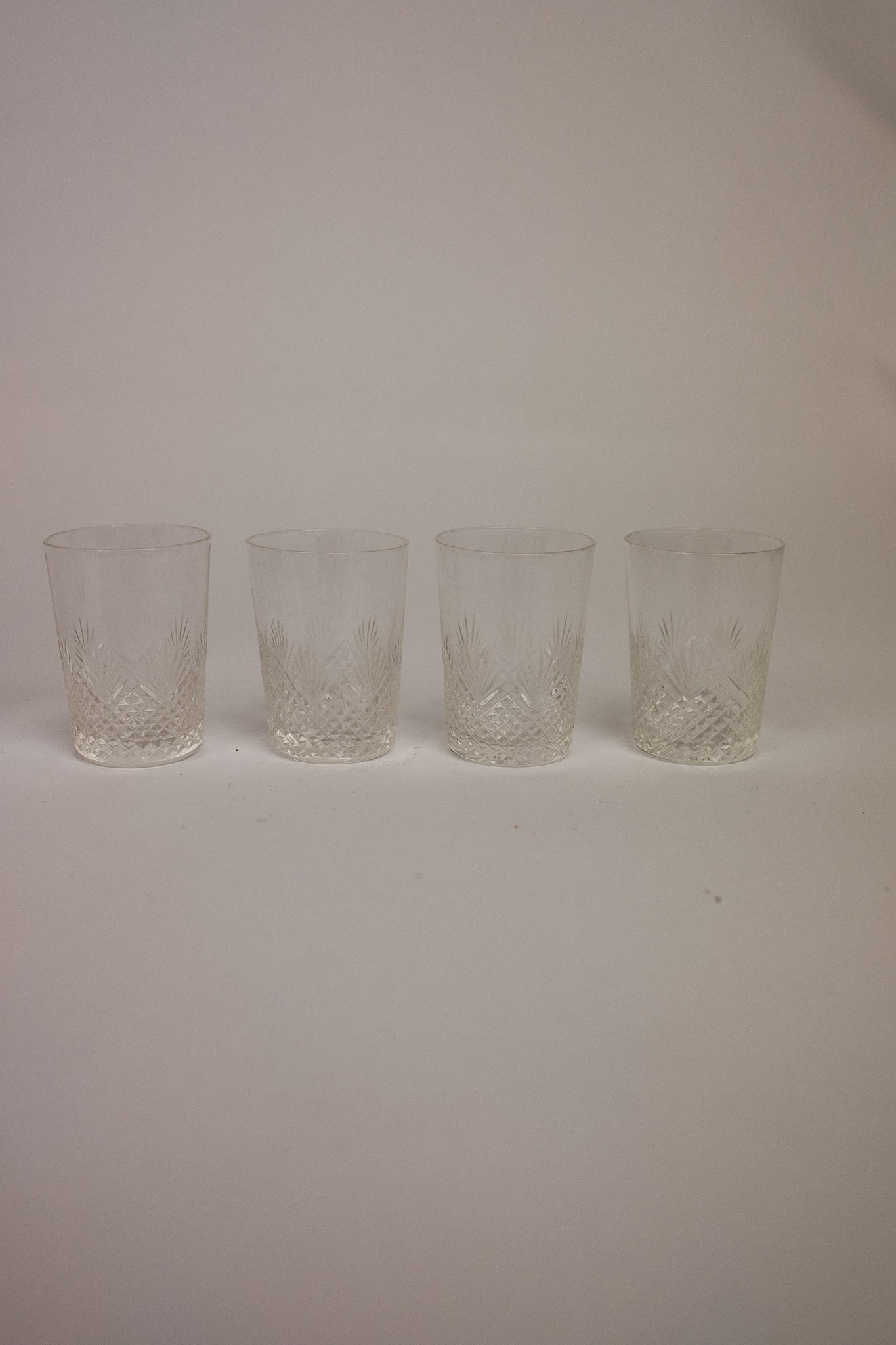 Set van 6 kristallen limonade/waterglazen met 4 bijpassende shotglaasjes