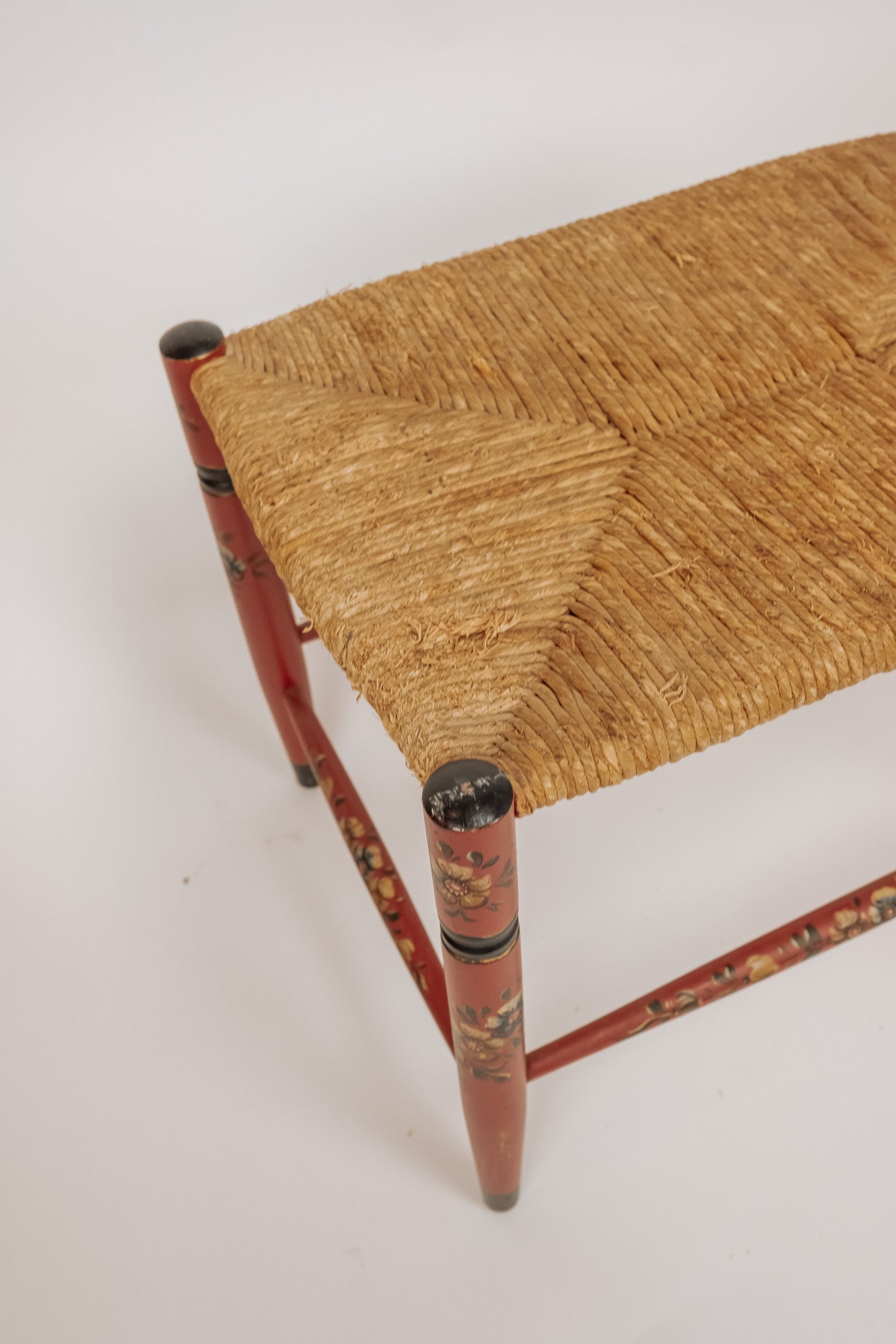 Wooden stool with burgundy papercord seat