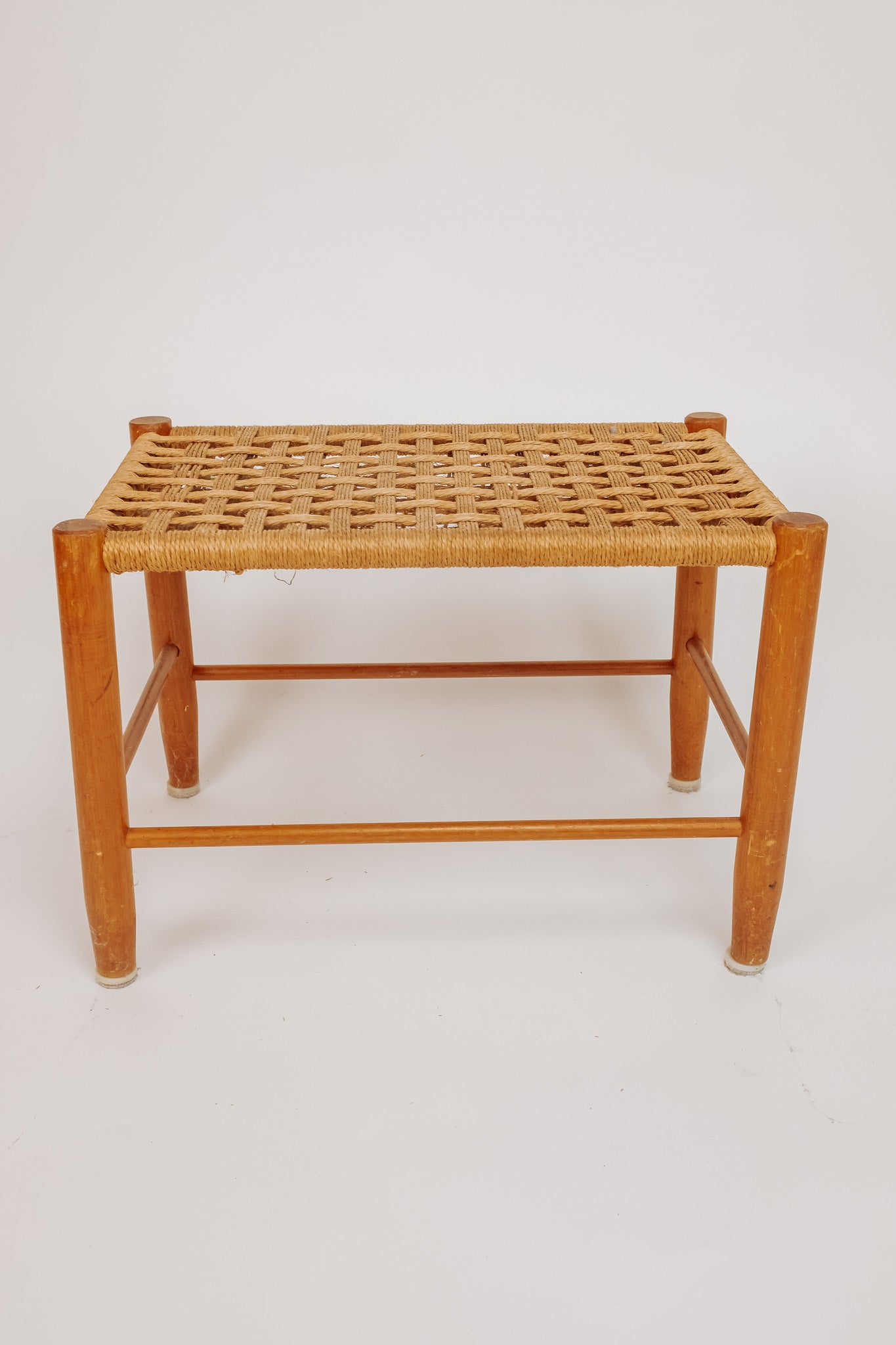 Wooden stool with burgundy papercord seat