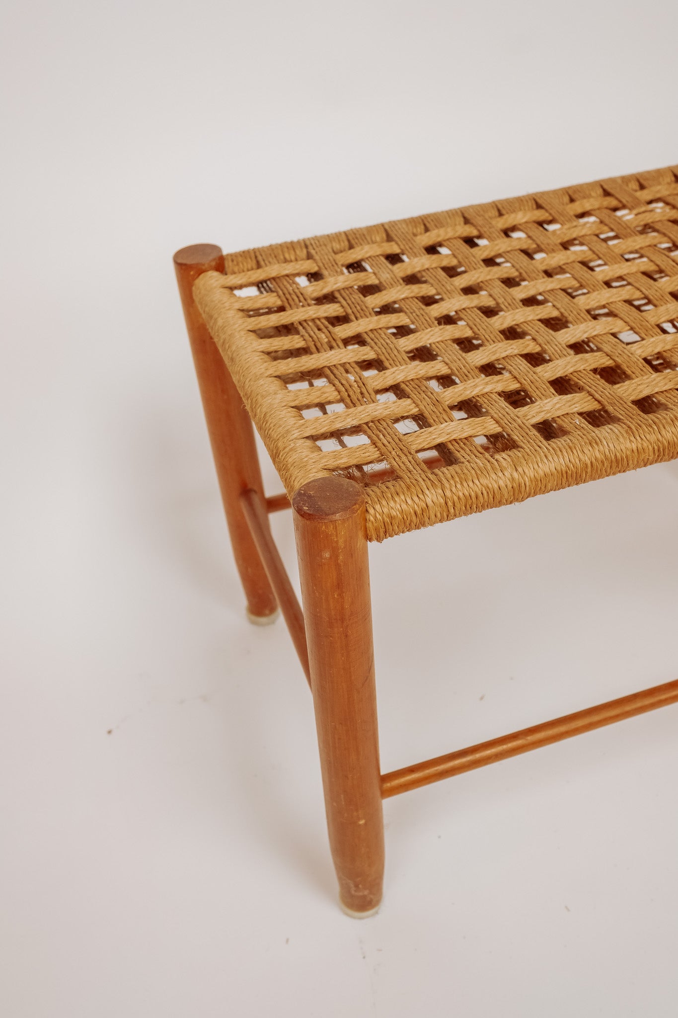 Wooden stool with burgundy papercord seat