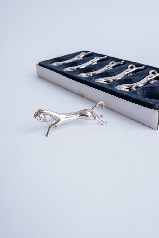 Set van 6 zilveren paarden messenleggers