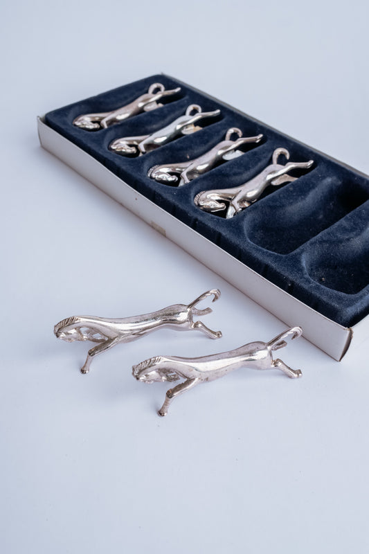 Set van 6 zilveren paarden messenleggers