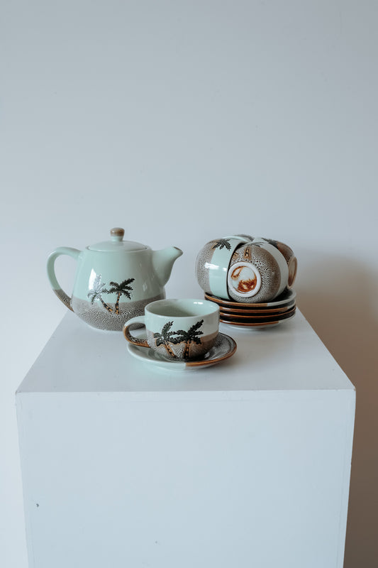 Vintage theeservies lichtblauw met palmbomen