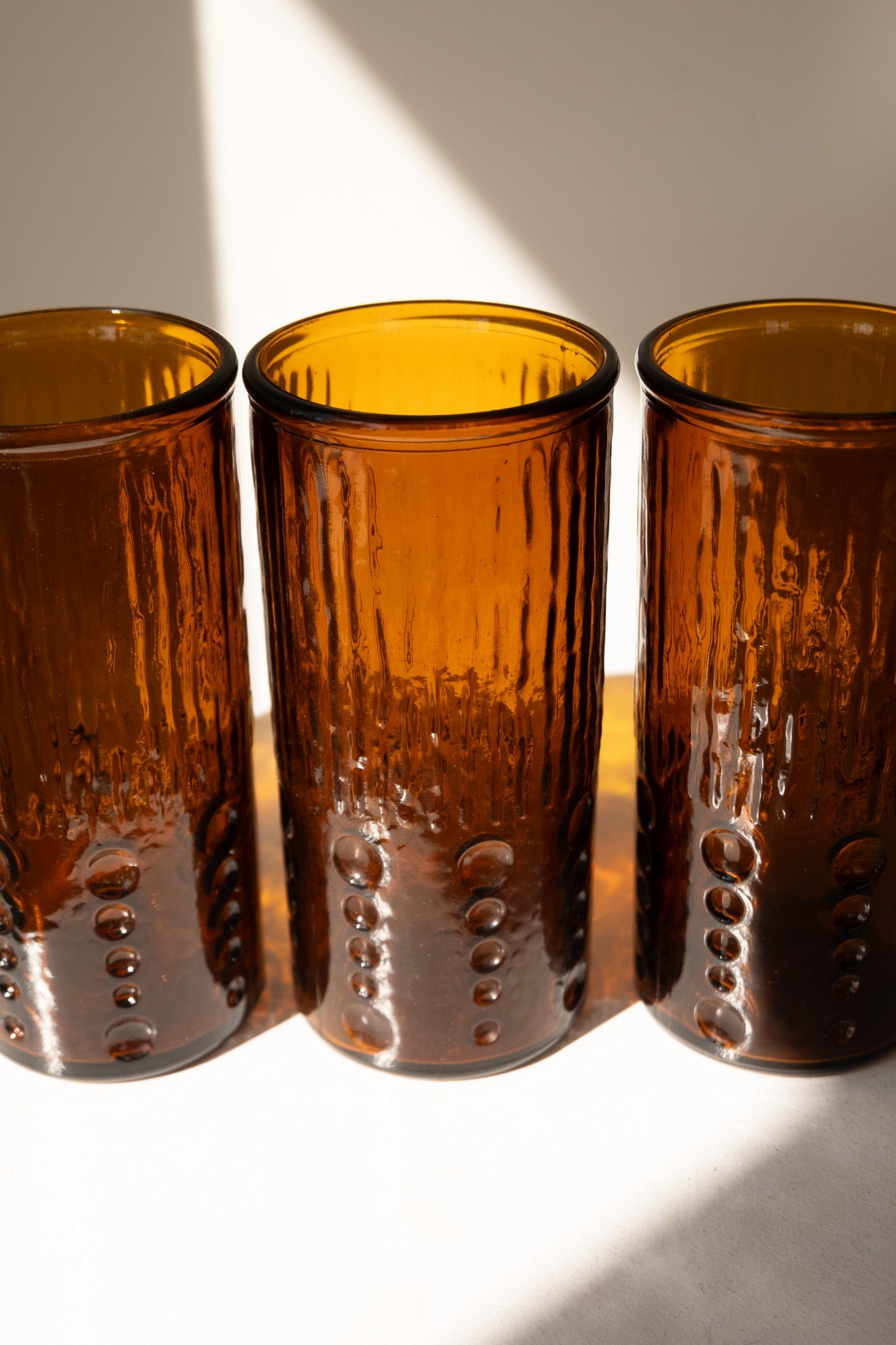 Amberkleurige longdrinkglazen set van 6 in geperst glas