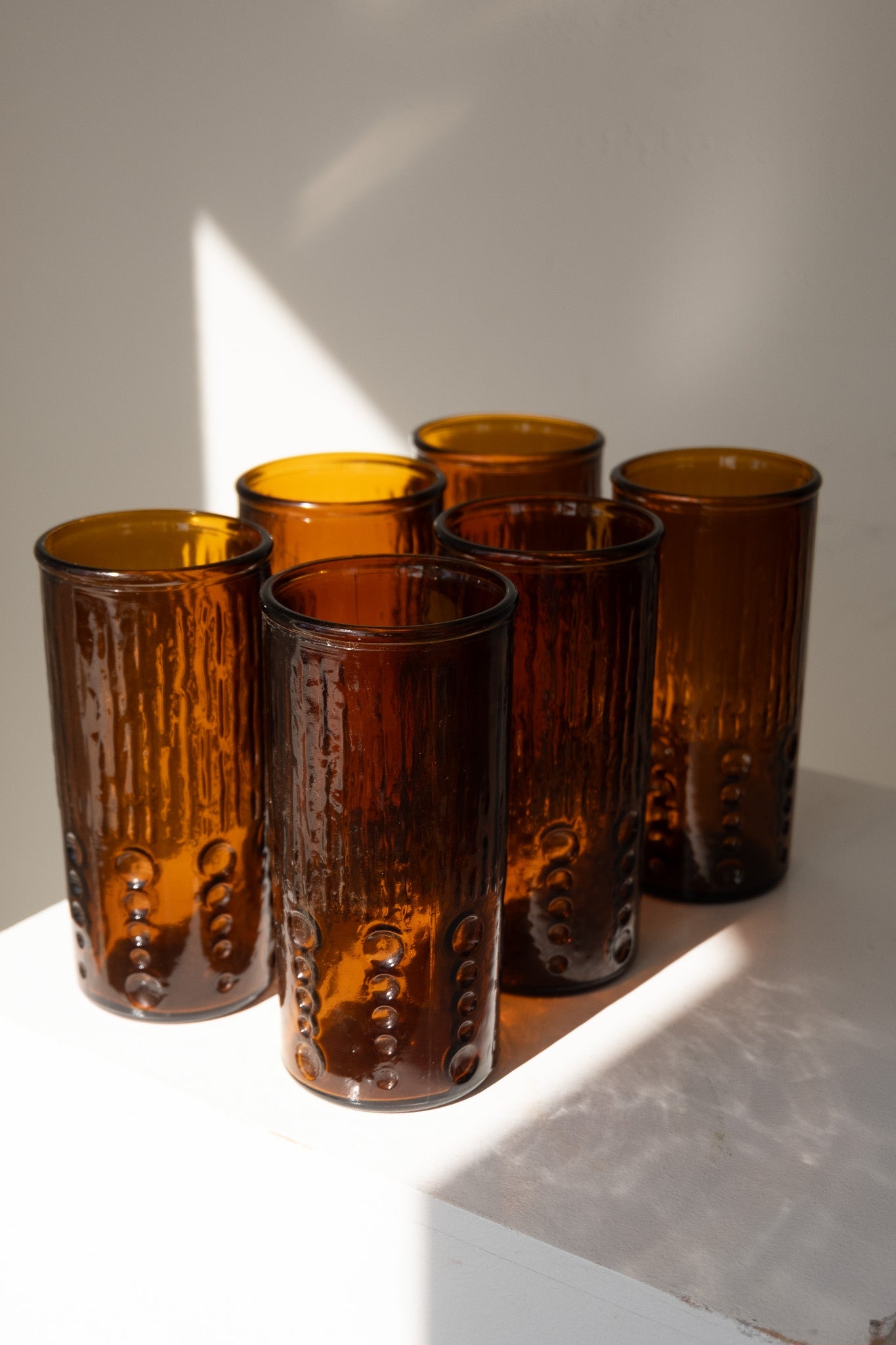 Amberkleurige longdrinkglazen set van 6 in geperst glas