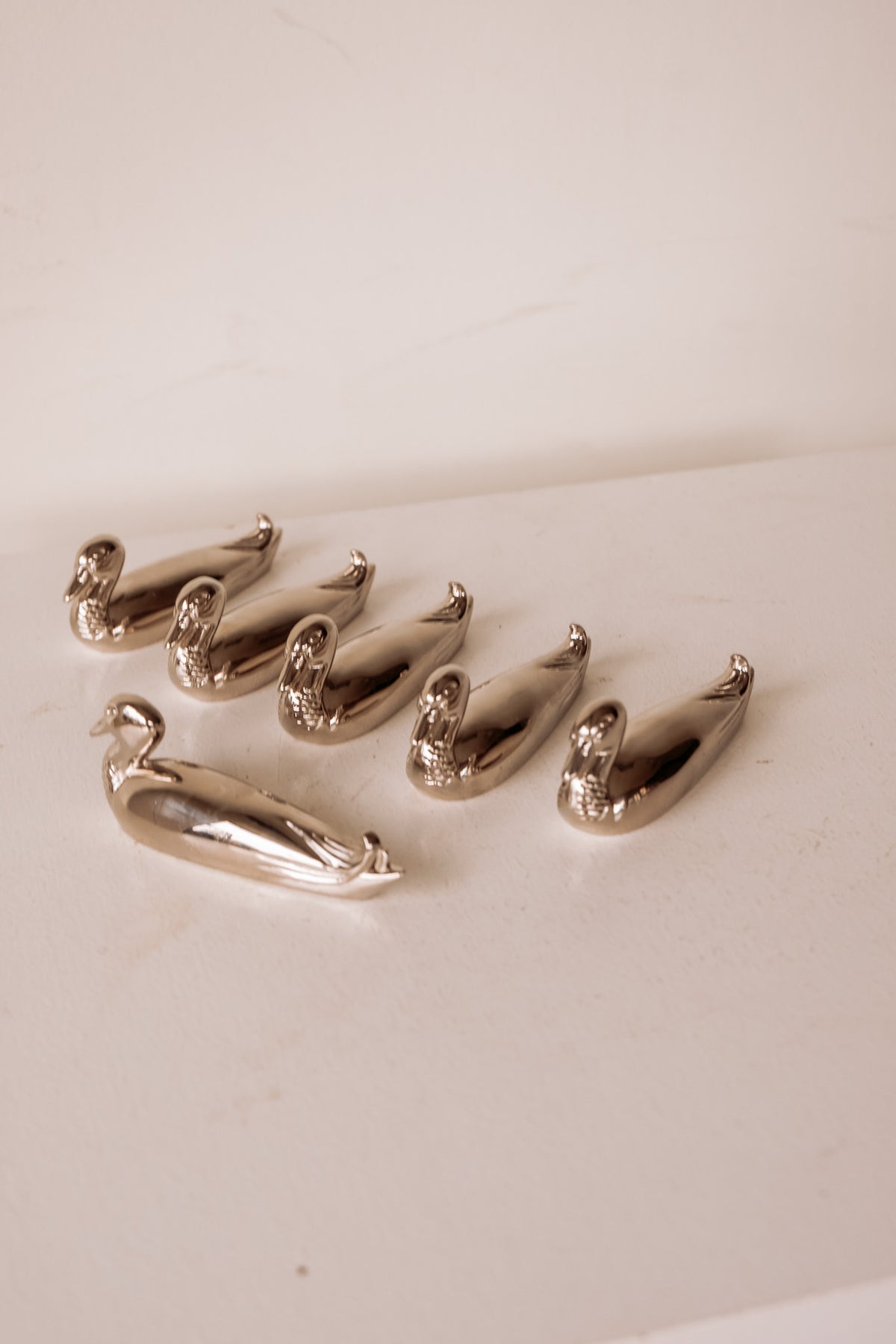 Set van 6 zilveren zwanen messenleggers