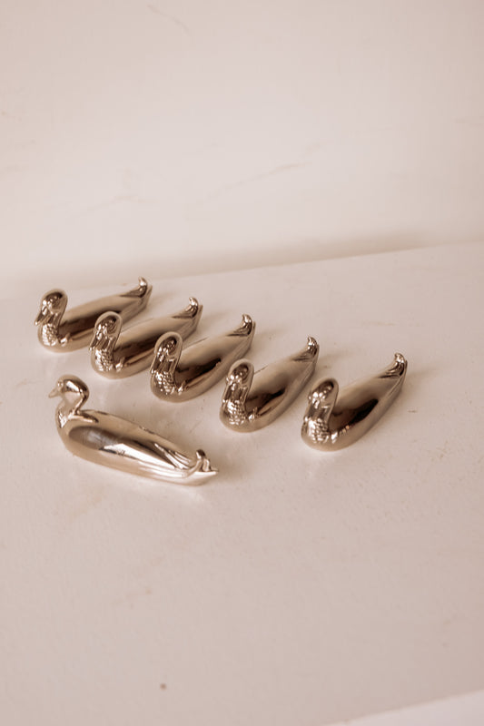 Set van 6 zilveren zwanen messenleggers