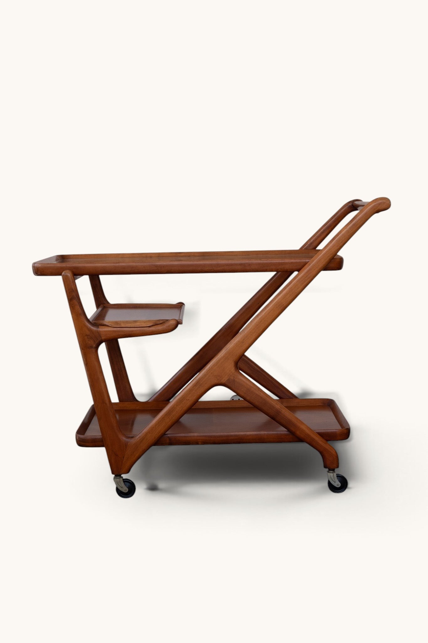 tessvintage Cesare Lacca mid-century wooden bar cart with Z-frame design, three tiers, and rolling wheels
