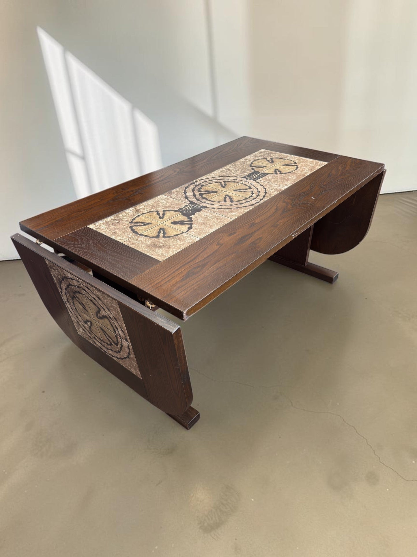tessvintage Danish extendable dining table by Poul Poulsen with graphic ceramic tile inlay in earthy tones