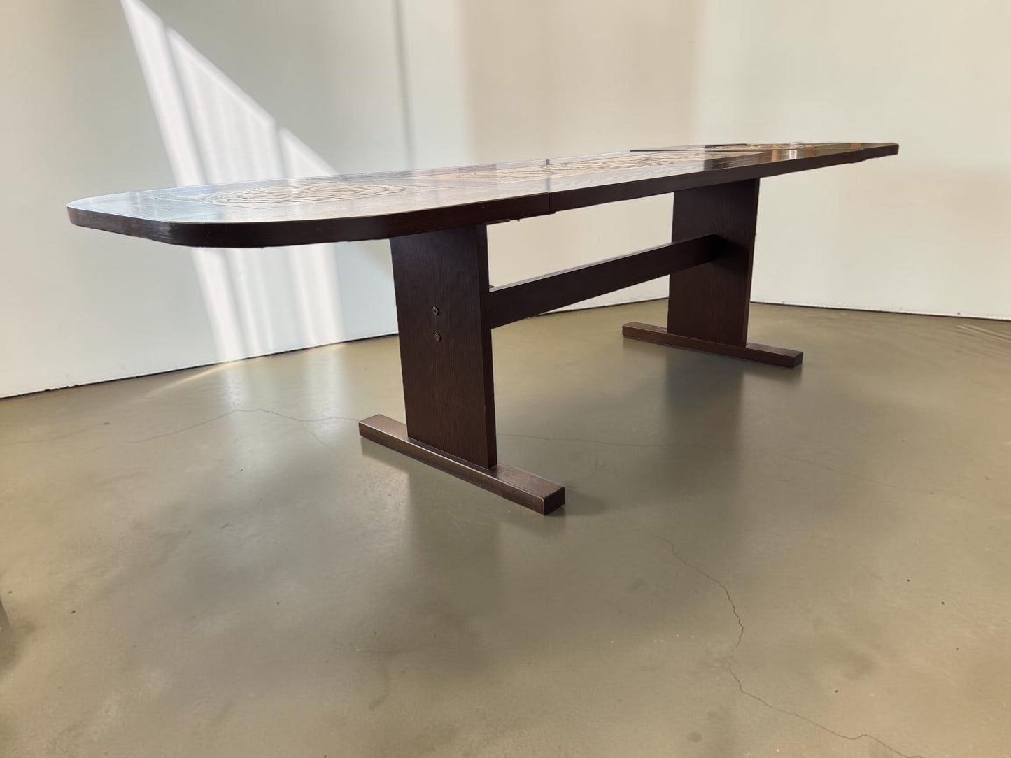 tessvintage Poul Poulsen extendable Danish dining table with graphic ceramic tile inlay in earthy tones