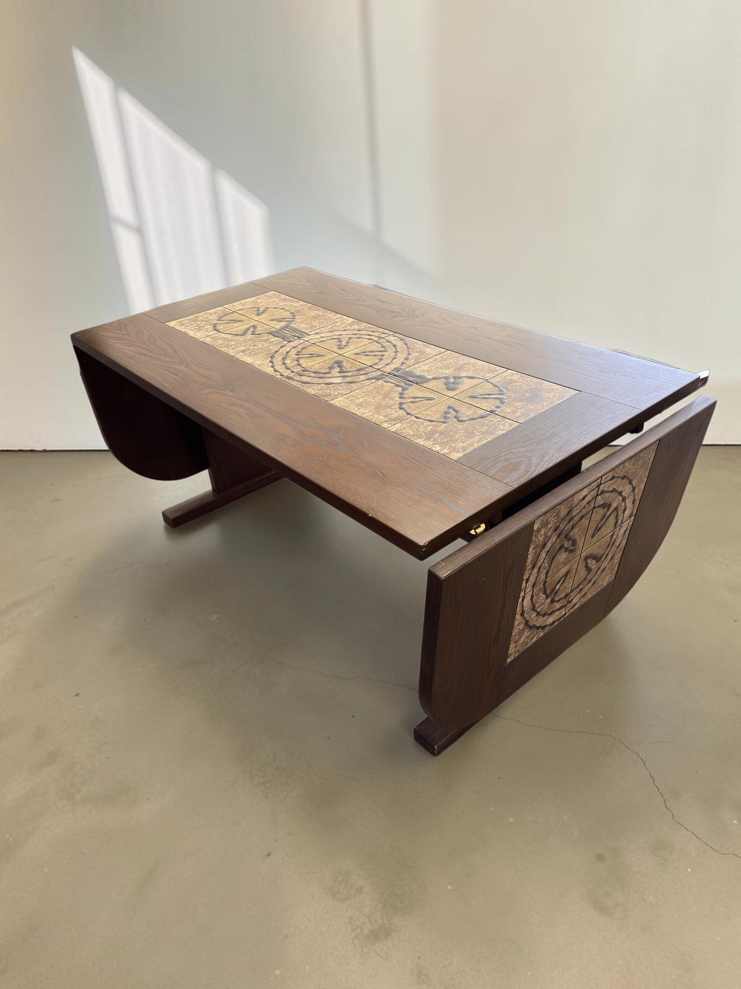 tessvintage Danish extendable dining table by Poul Poulsen with graphic ceramic tile inlay in earthy tones
