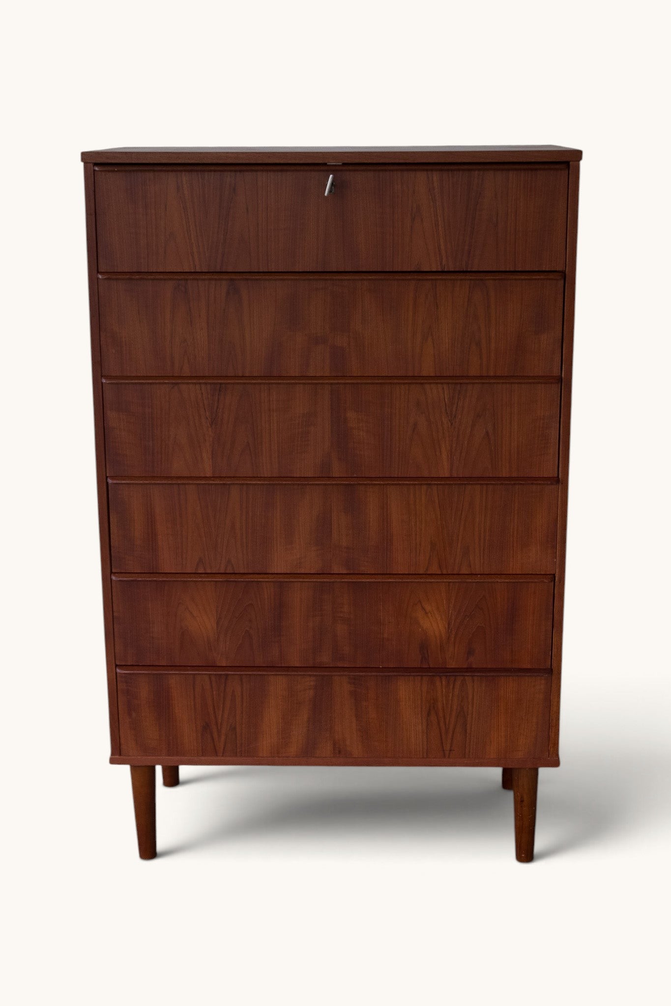 tessvintage vintage Danish teak tallboy chest of drawers with seven drawers and carved wooden handles