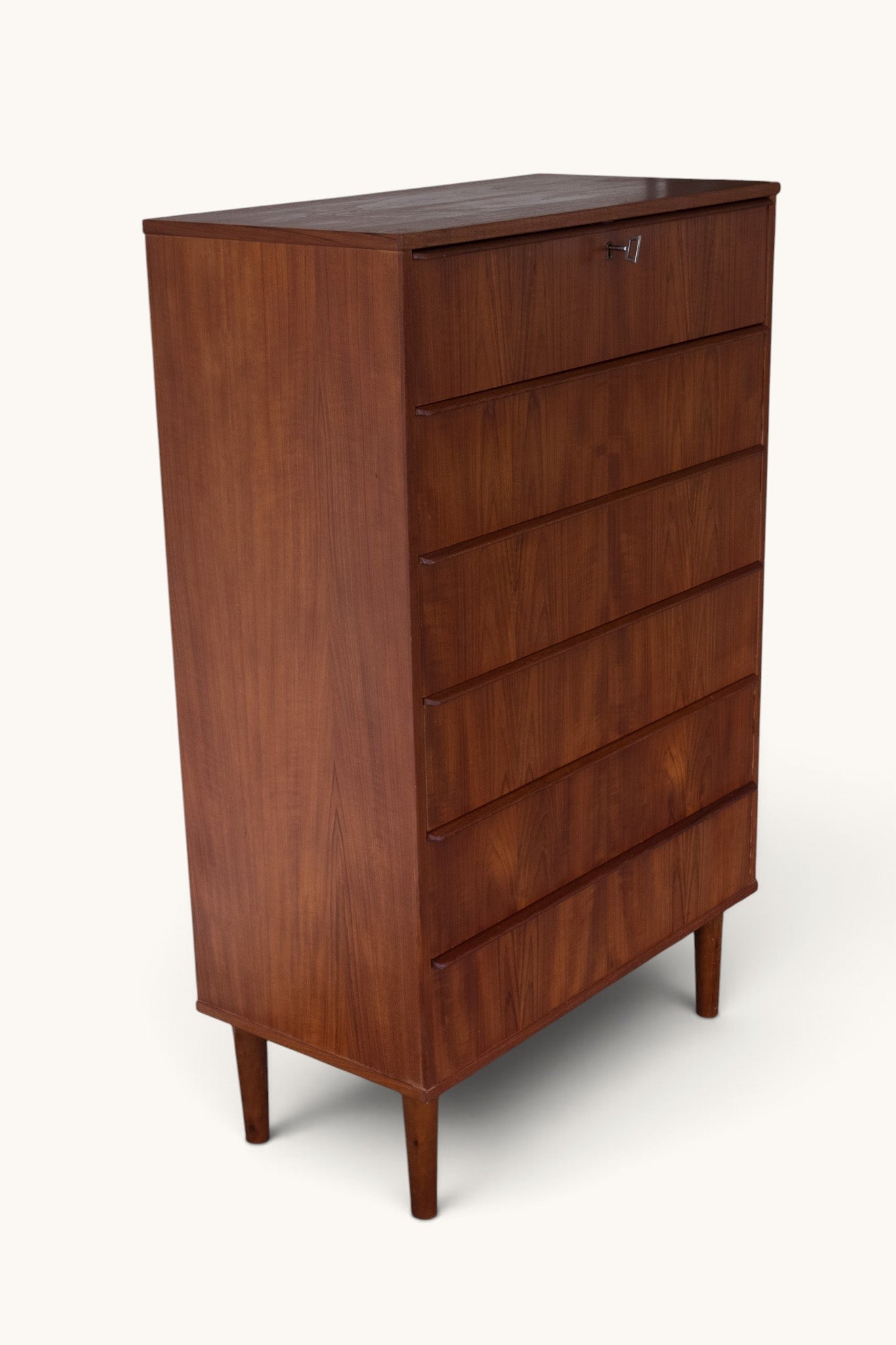 tessvintage 1960s Danish teak tallboy chest of drawers with seven drawers and a lockable top drawer