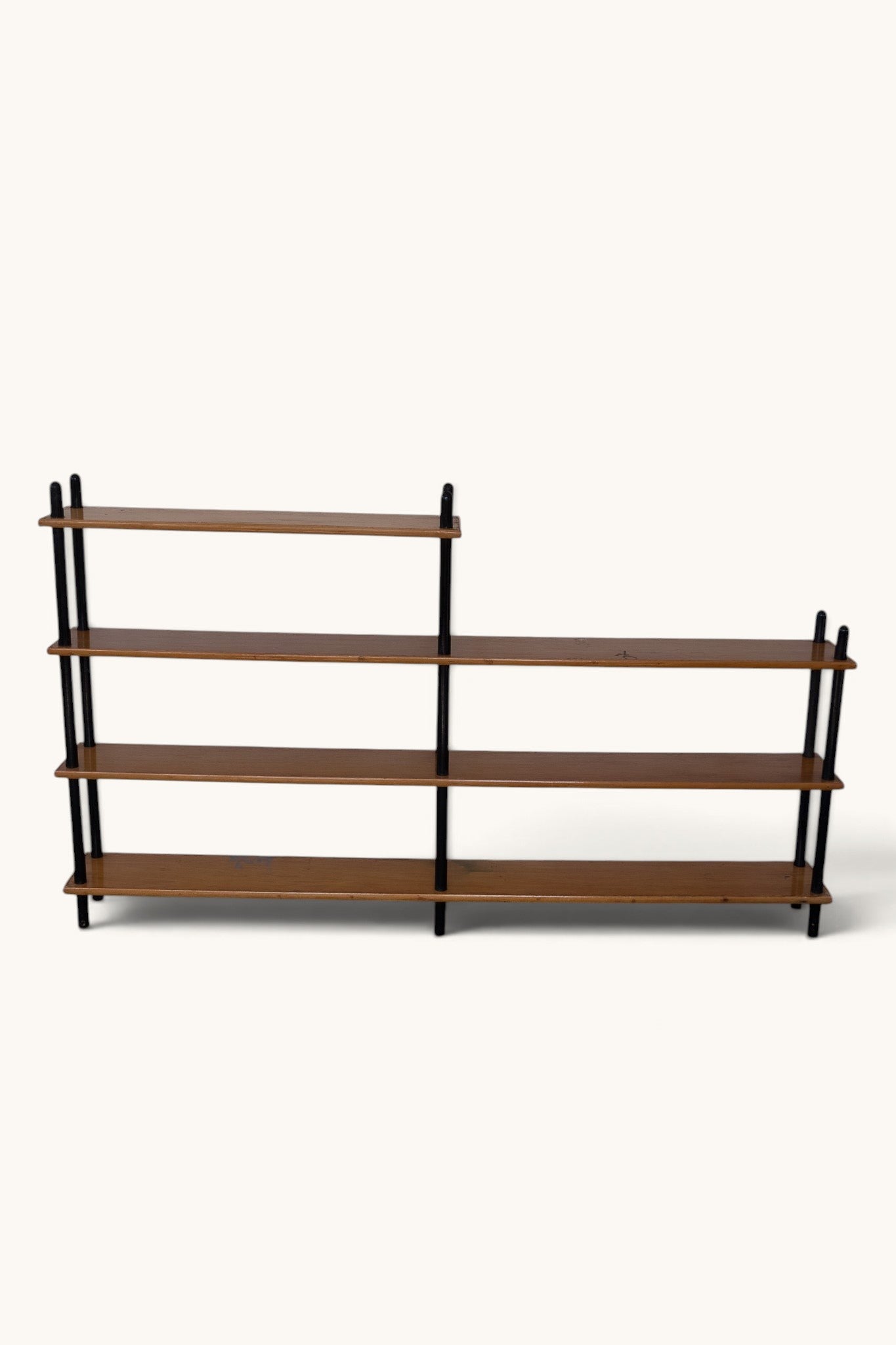 tessvintage 1960s mid-century modern wooden shelving unit with black lacquered poles and four tiered shelves