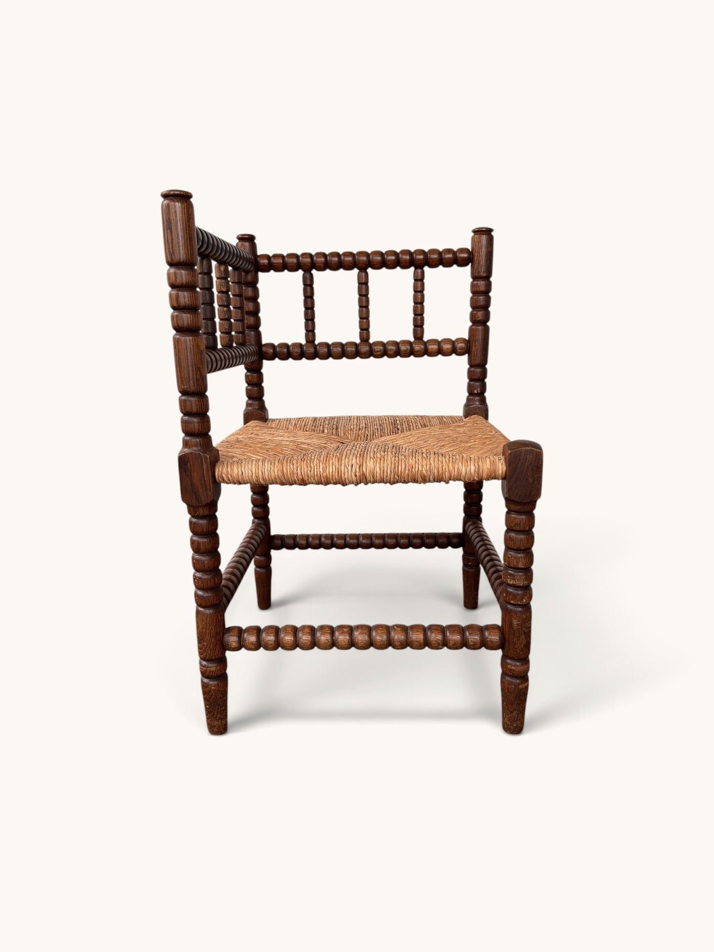 tessvintage vintage oak corner chair with bobbin turned spindles and a woven star-patterned rush seat