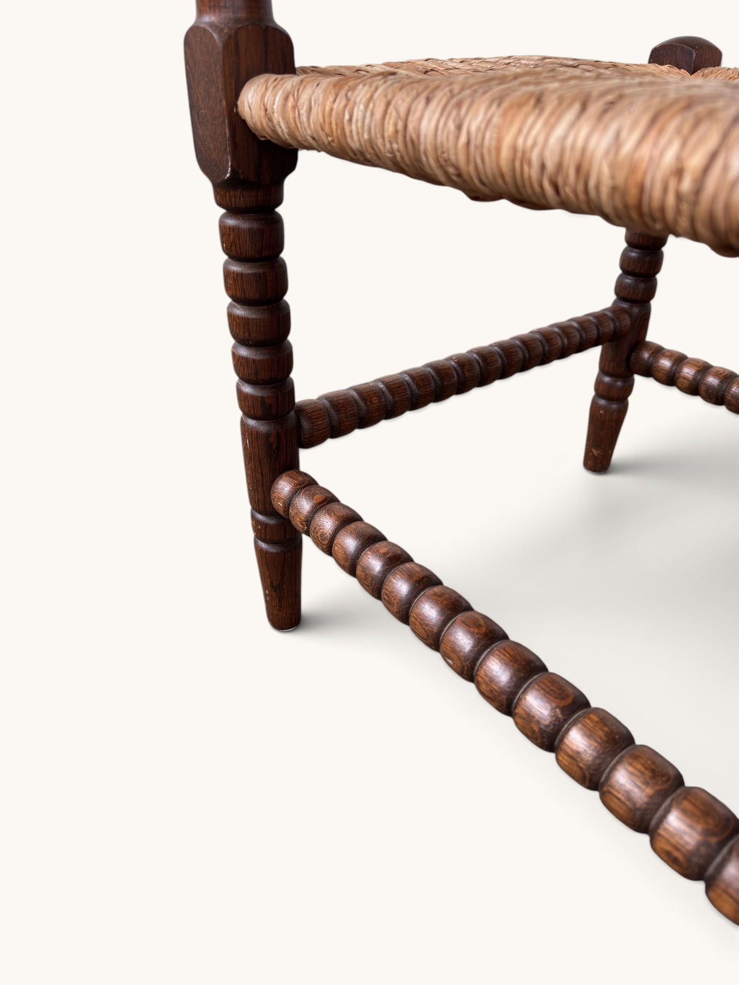 tessvintage vintage oak corner chair with turned bobbin legs and a woven rush seat in a star pattern