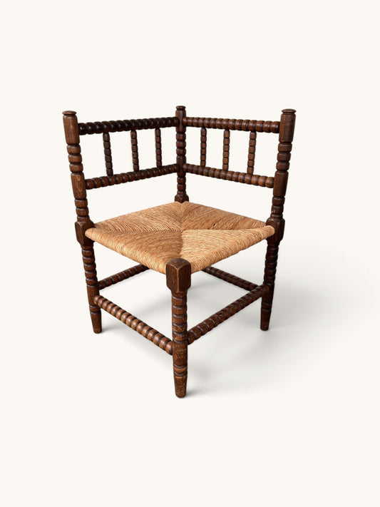 tessvintage vintage oak corner chair with bobbin turned spindles and a woven star-patterned rush seat