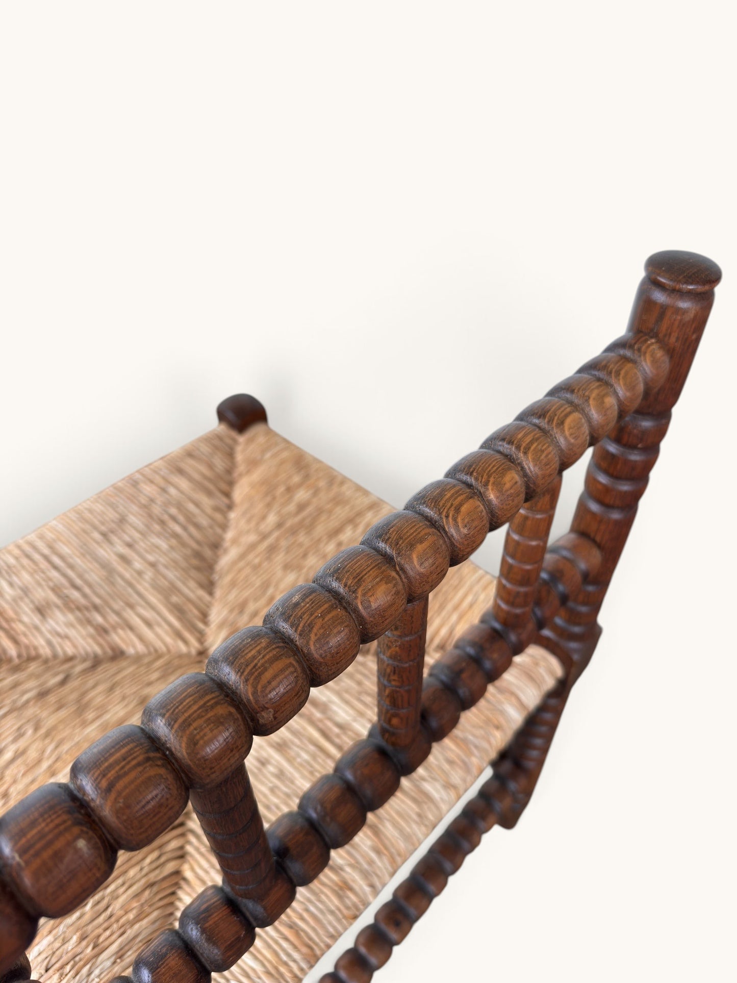 tessvintage vintage oak corner chair with turned bobbin spindles and a woven star-patterned rush seat