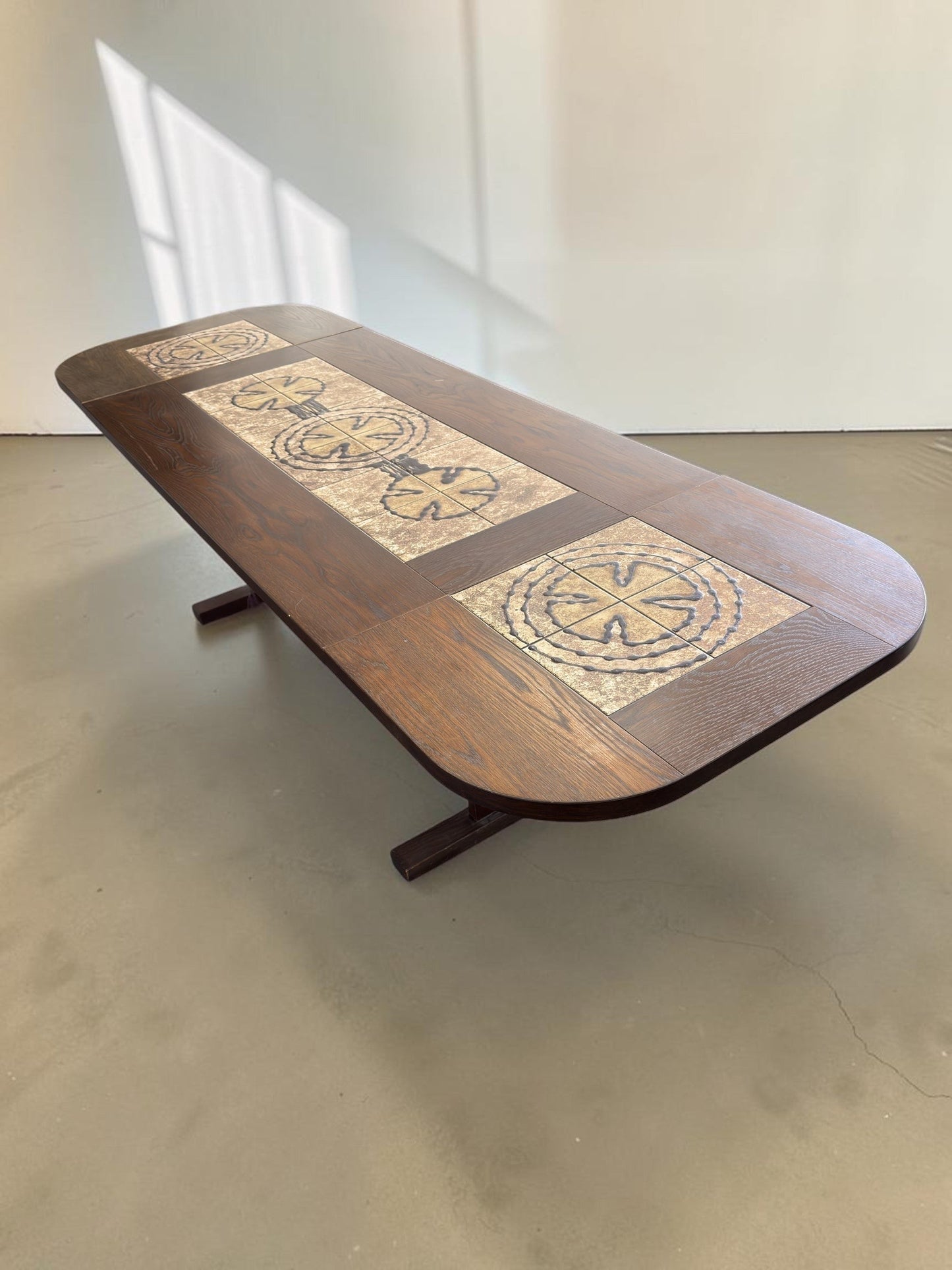 tessvintage Poul Poulsen extendable Danish dining table with dark wood and graphic ceramic tile inlay from the 1970s